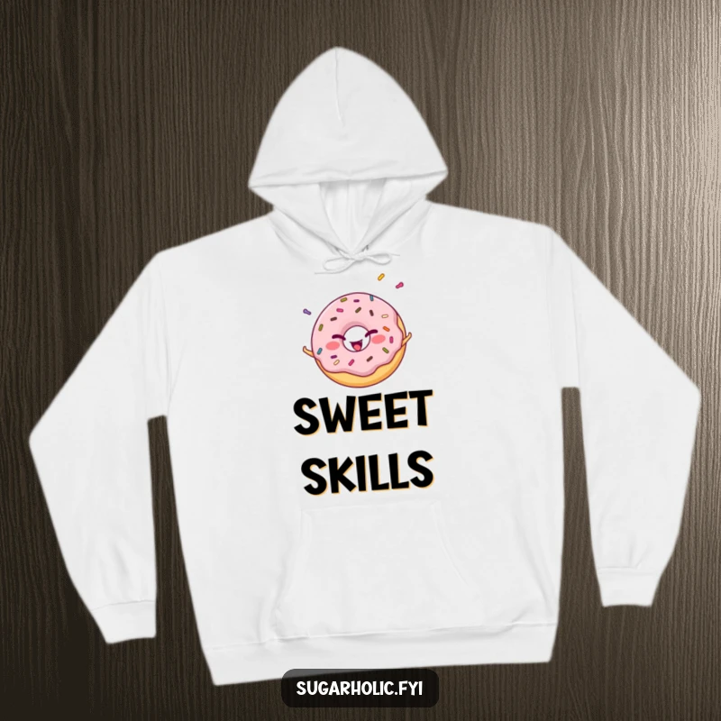 Funny cheerful donut character winking while juggling colorful sprinkles, a warm and humorous hoodie design.