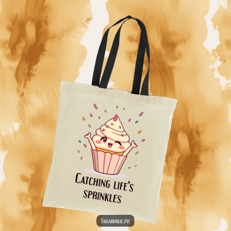 Funny Tote Bag: A winking cupcake character joyfully reaching for falling sprinkles, perfect for carrying goodies with a sweet touch.